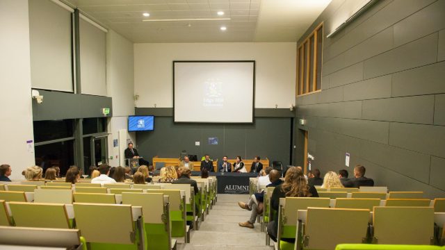 An image of a panel taking place consisting of past law students from Edge Hill University. 