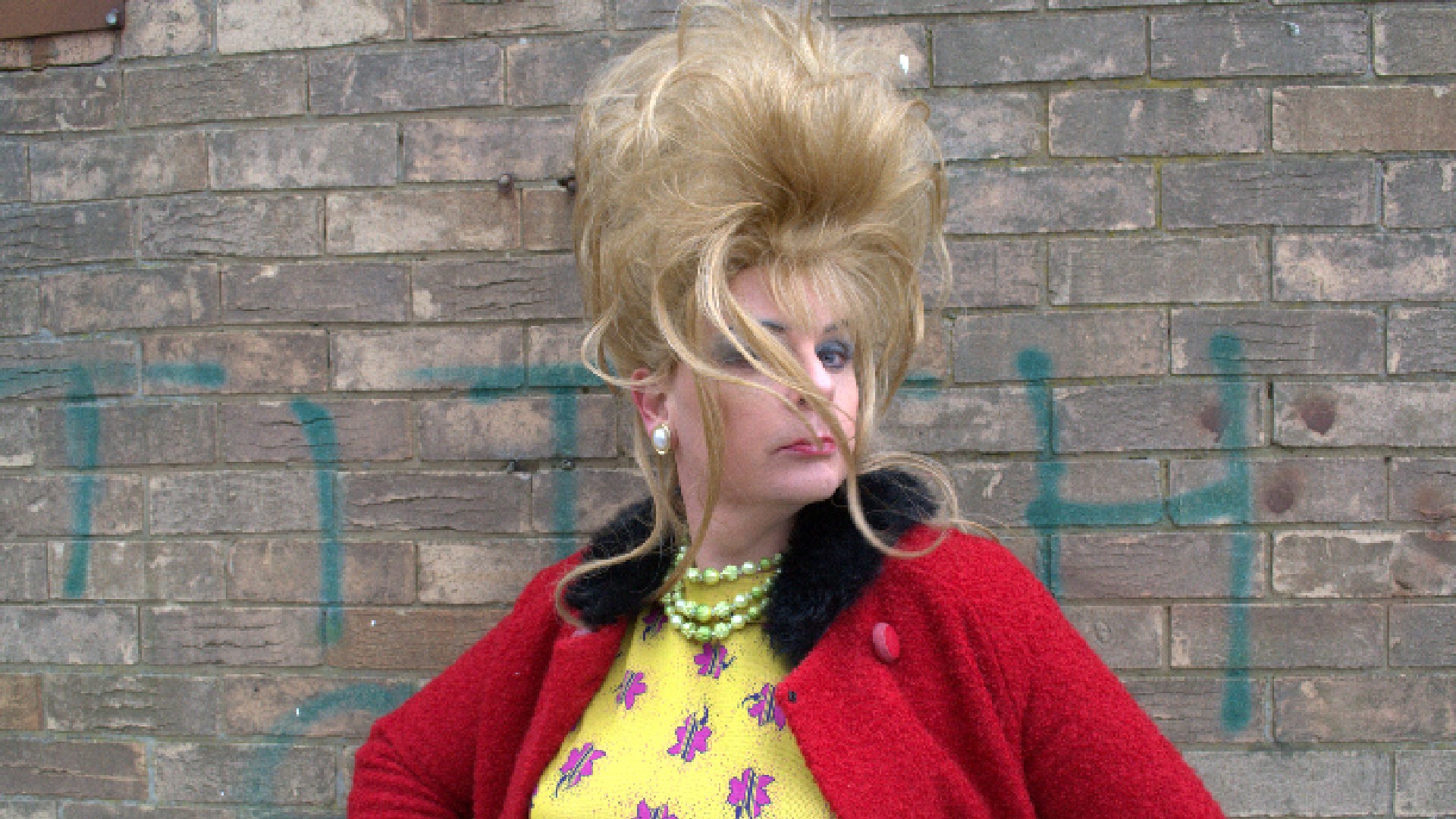 An image of a drag performer outside.
