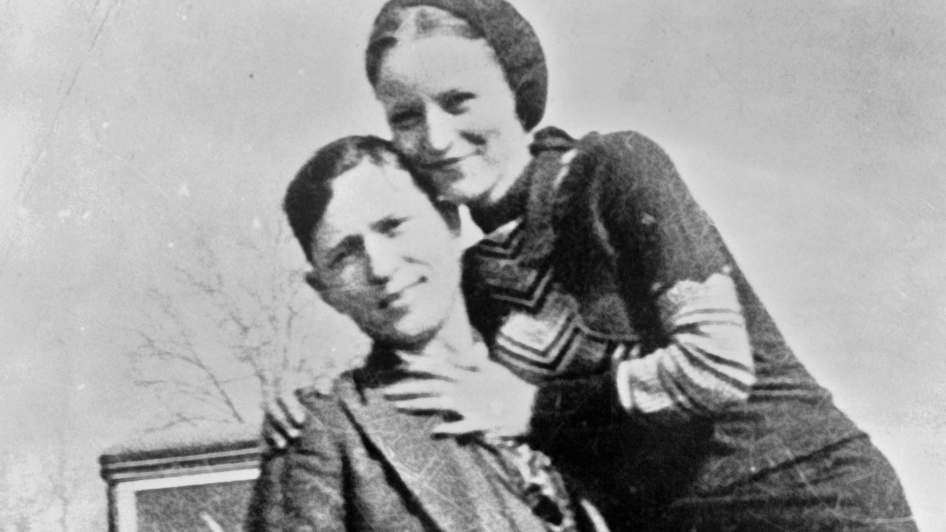  An image of Bonnie Parker and Clyde Barrow, an outlaw and his associate. 