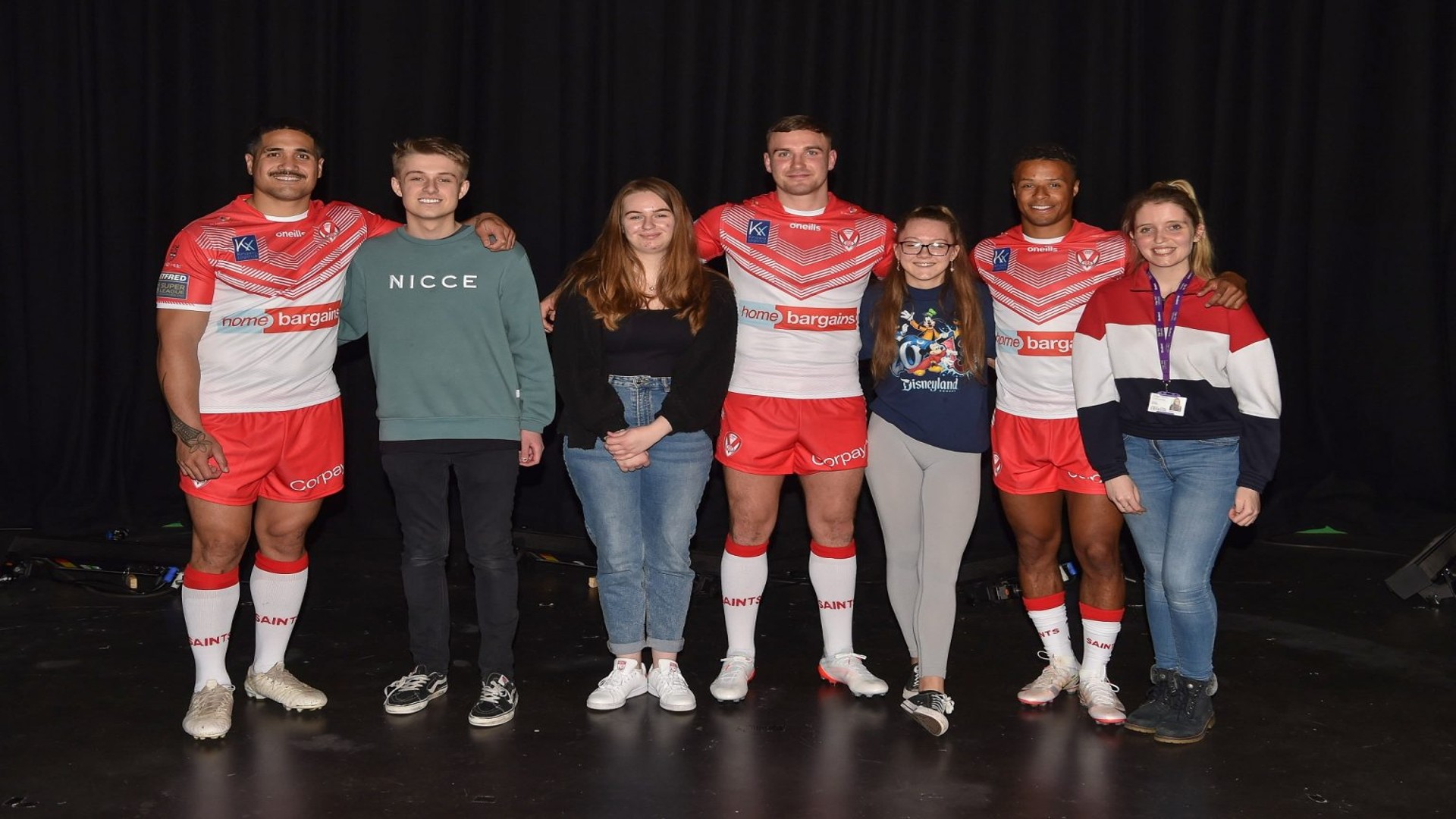 Edge Hill students stood with St Helens rugby players