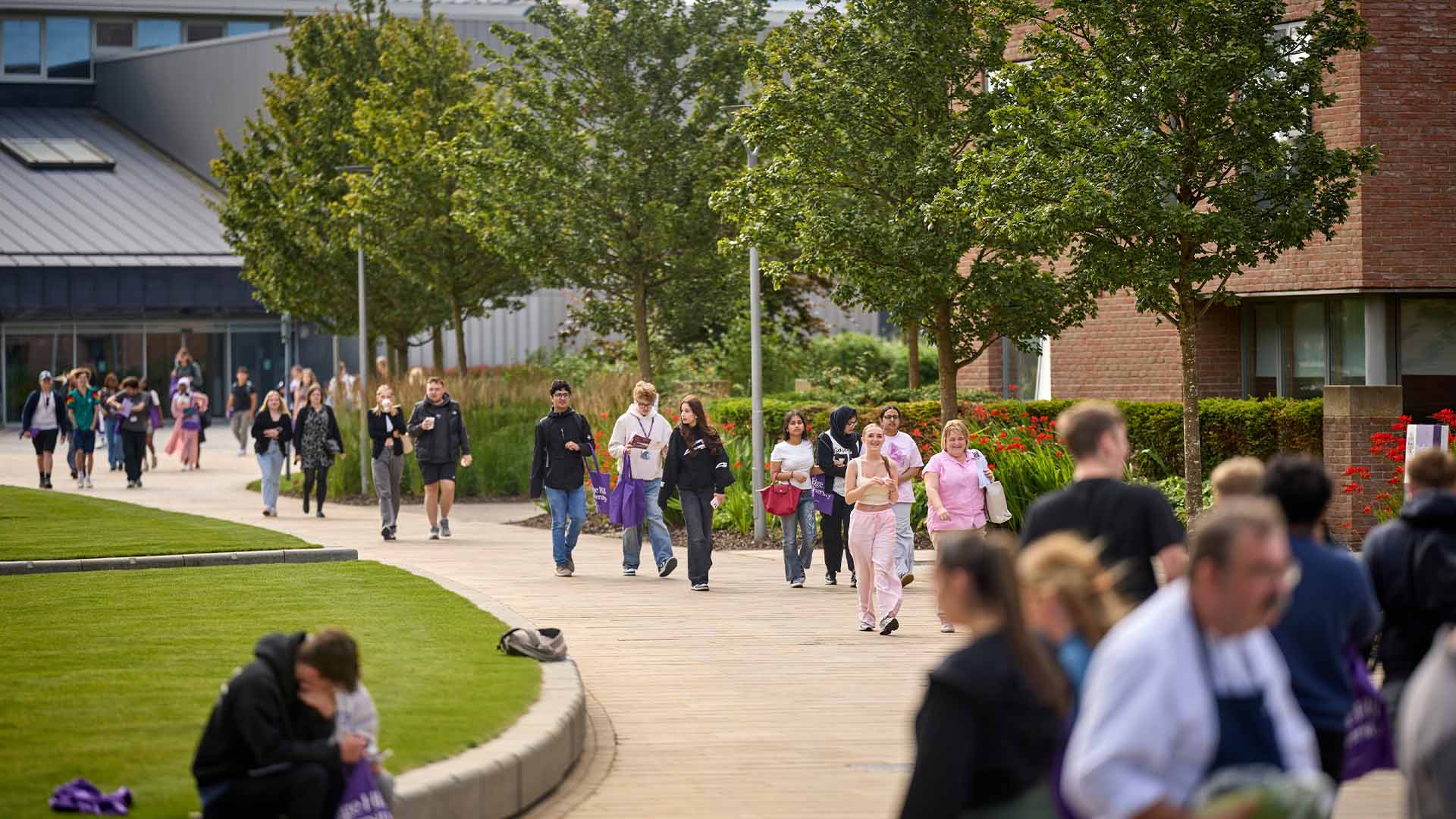 Visitors walking through campus on an Edge Hill Open Day
