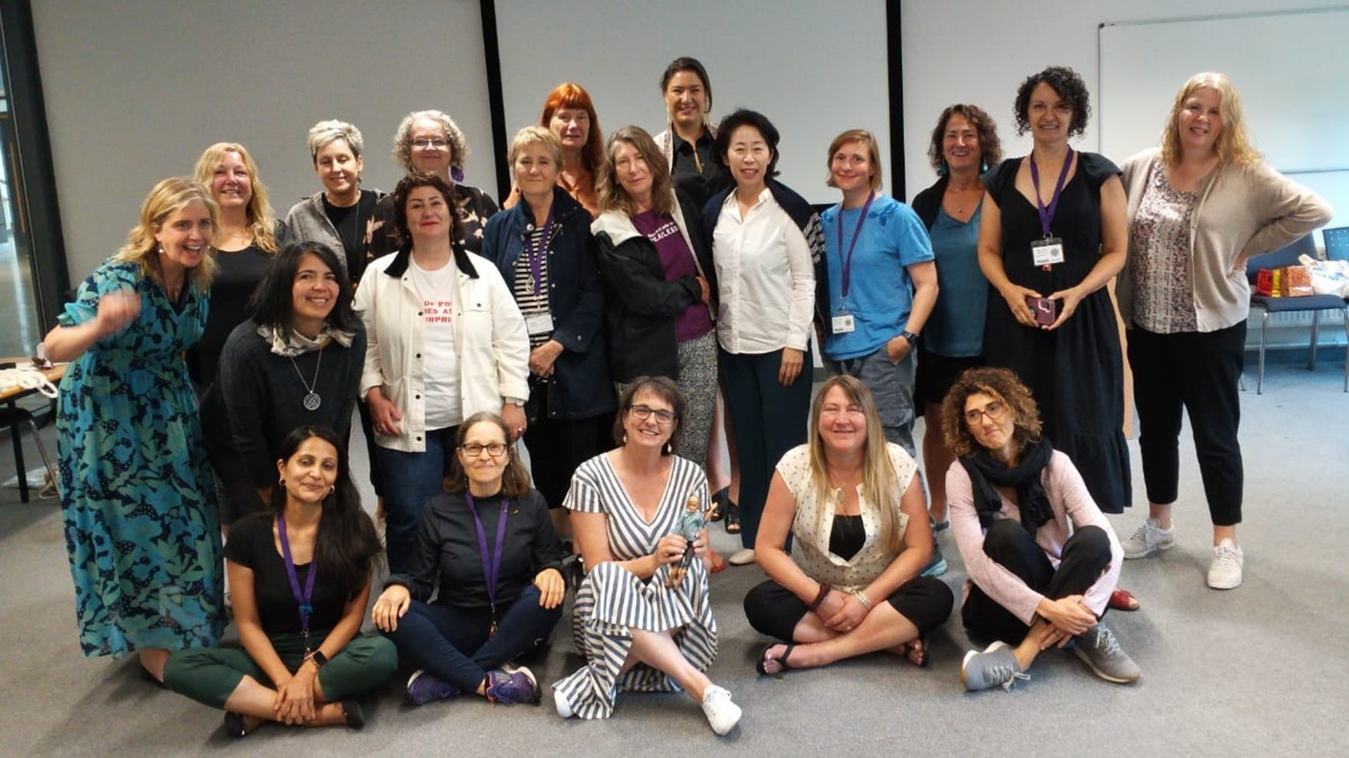 Group of researchers, academics and artists at a feminism conference