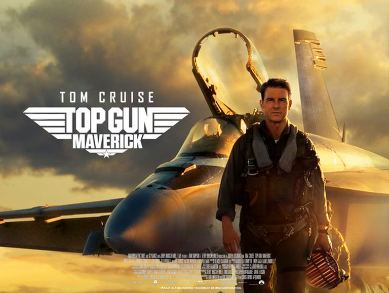 Tom Cruise stands Infront of plane for 'Top Gun Maverick' poster picture.