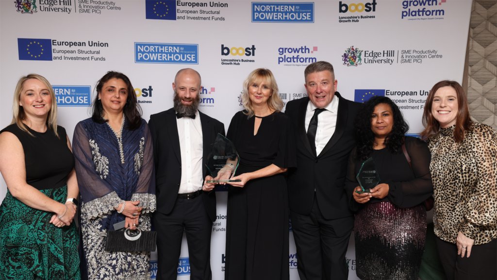 Liverpool's Progress Group pose with trophies at the Innovation Awards