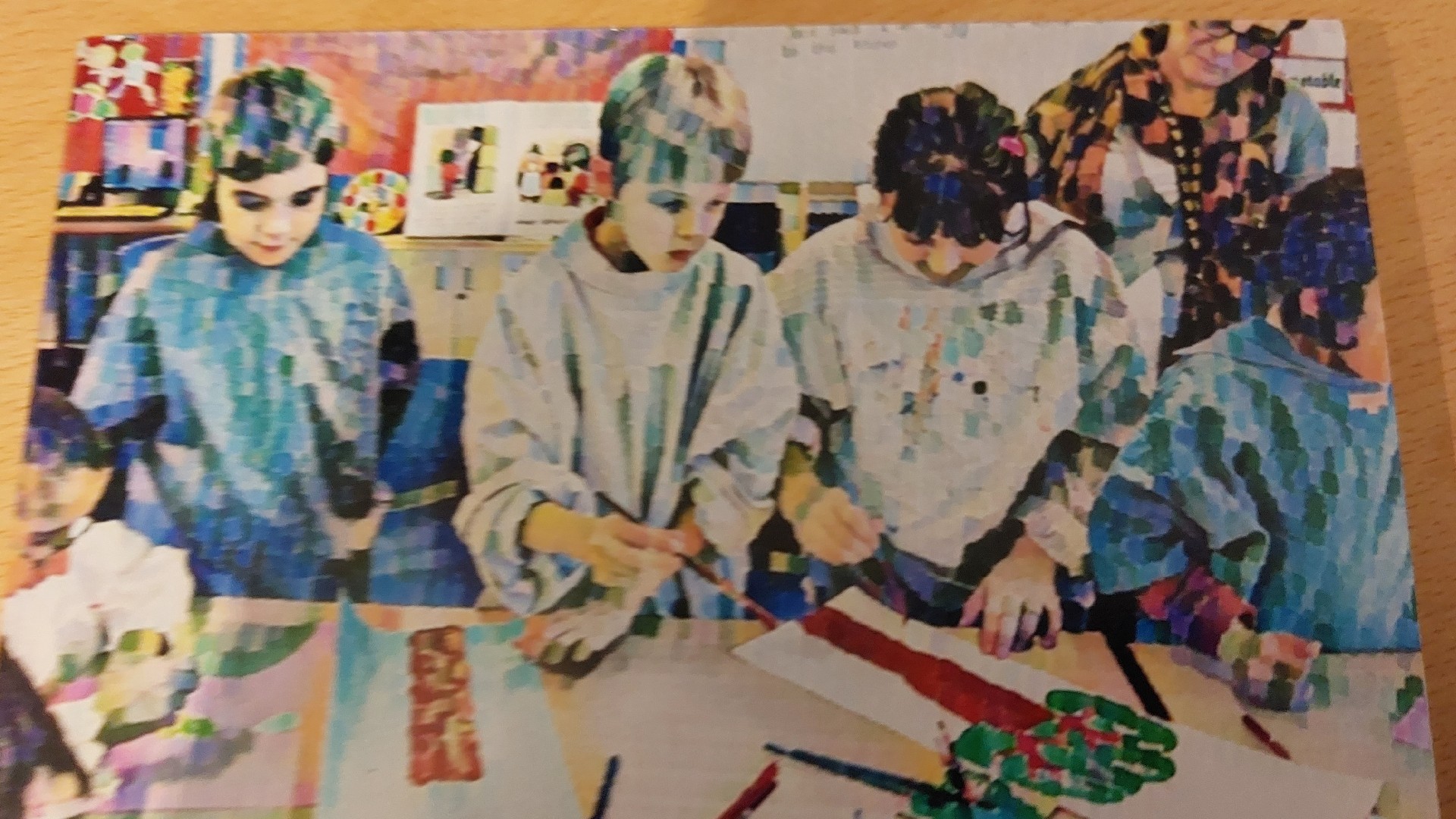 A painting of children working on their own paintings in a classroom.
