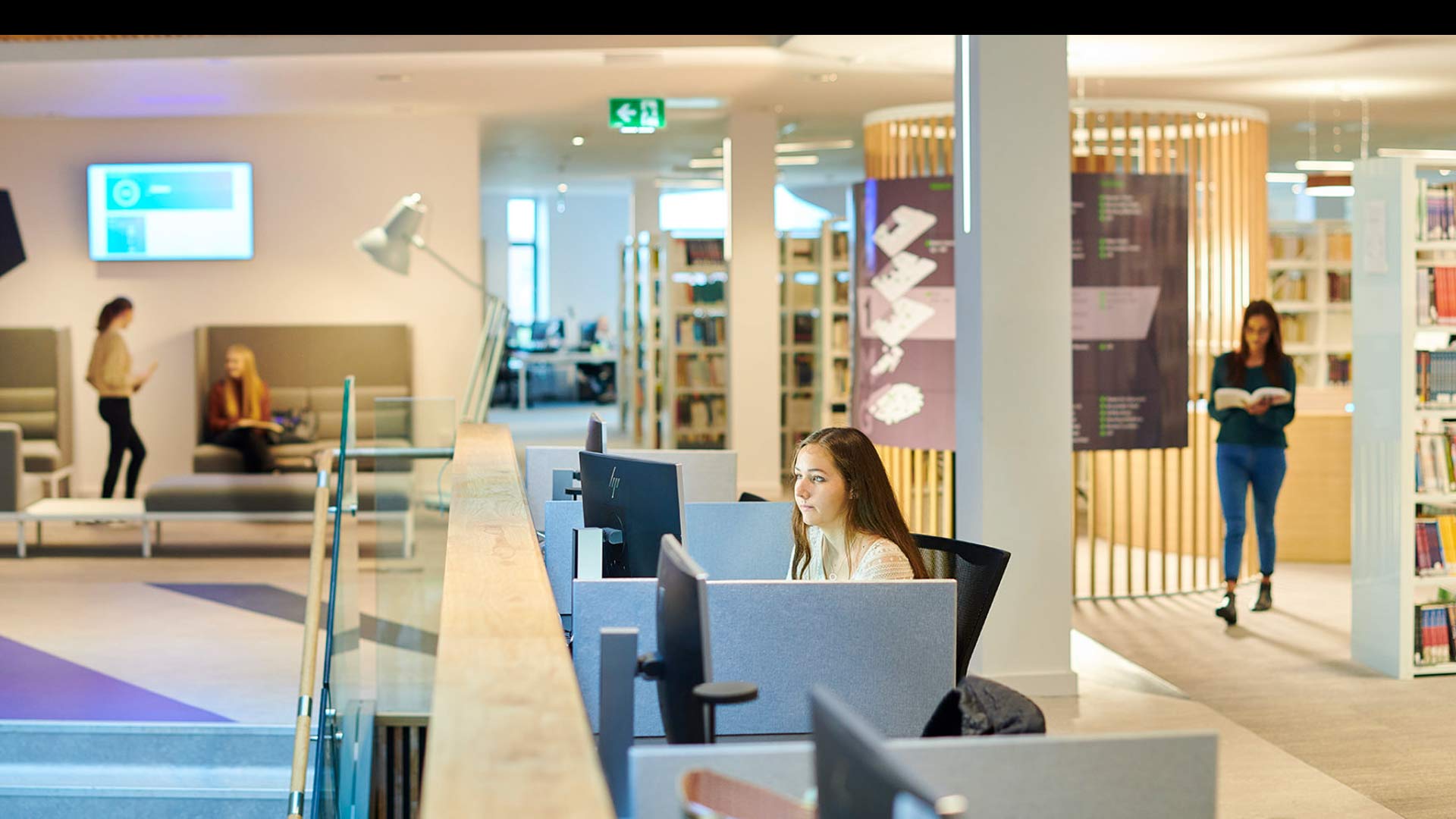 A student studying on a computer in the Catalyst