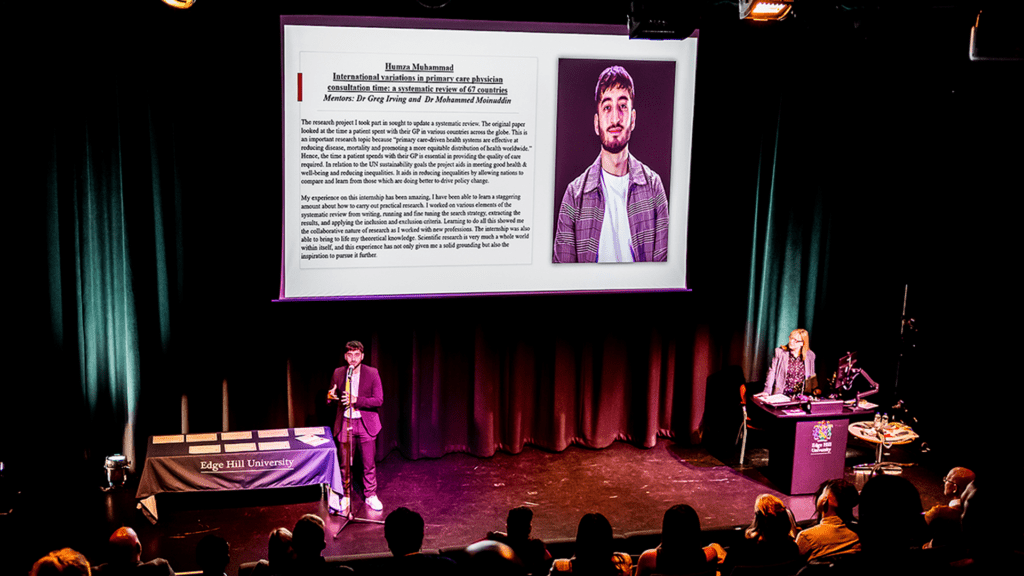 Humza Muhammad on stage at the RIMES celebration event alongside Professor Fiona Hallett.