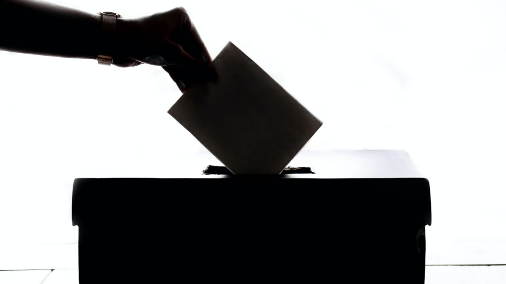 A silhouetted hand places an election ballot into a box. Student Politics Blog looking ahead to the West Lancashire by-election to replace Rosie Cooper