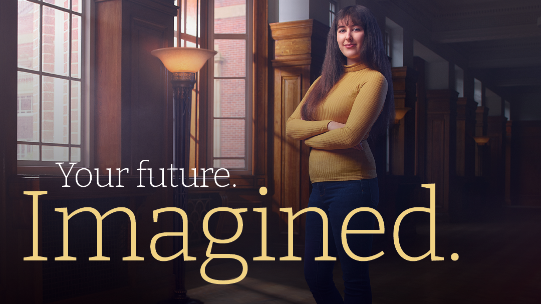 A student standing in Sages in the Hub building. Text overlay reads 'Your future imagined.'