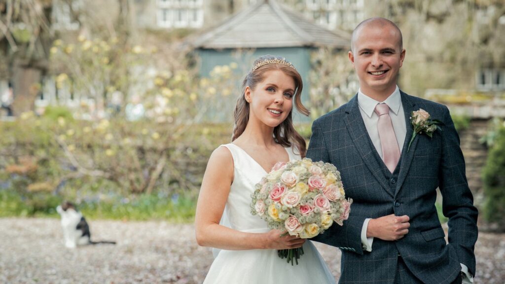 A picture of Ben and Phoebe on their wedding day.