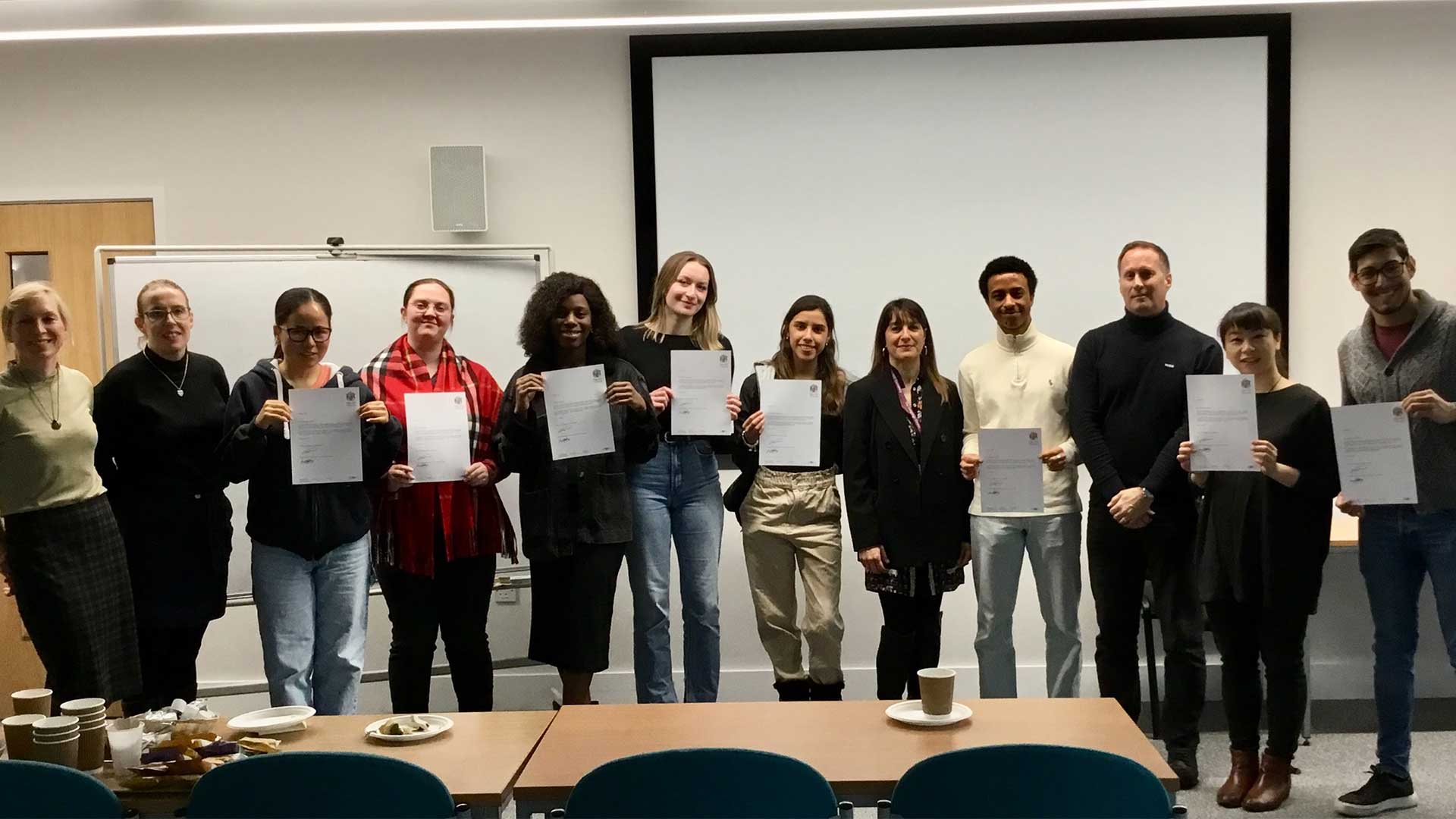 the language centre students team picture celebrating completing their workshops