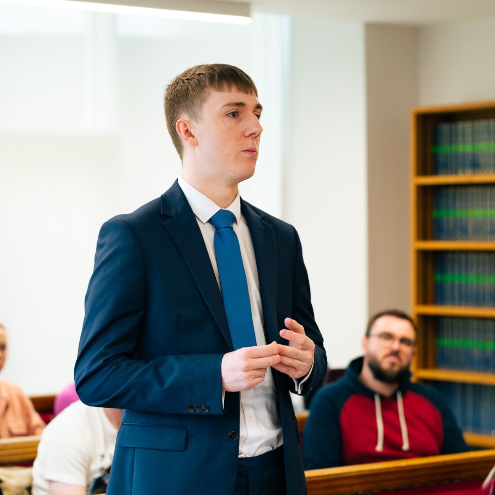 Matthew Sunderland law student stood up during moot session
