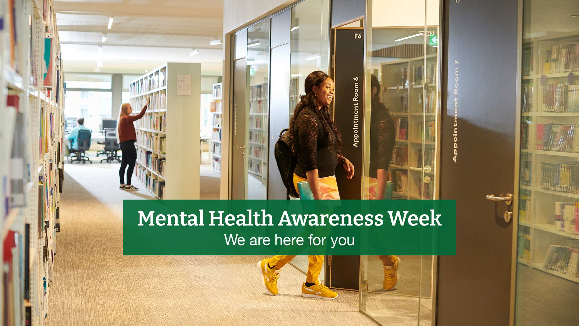 Mental health awareness week woman entering a wellbeing appointment at catalyst. text reading mental health awareness week, we are here for you