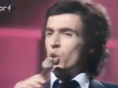 Portuguese entry Paulo de Carvalho performs at the 1974 Eurovision Song Contest.