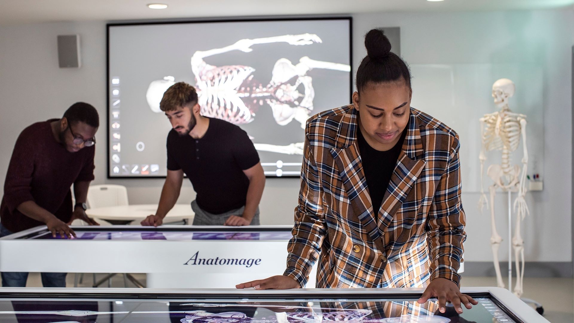 Students use the Anatomage Tables in the anatomy and ultrasound research centre.