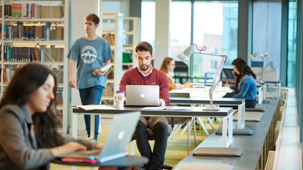 Students studying in the Catalyst.