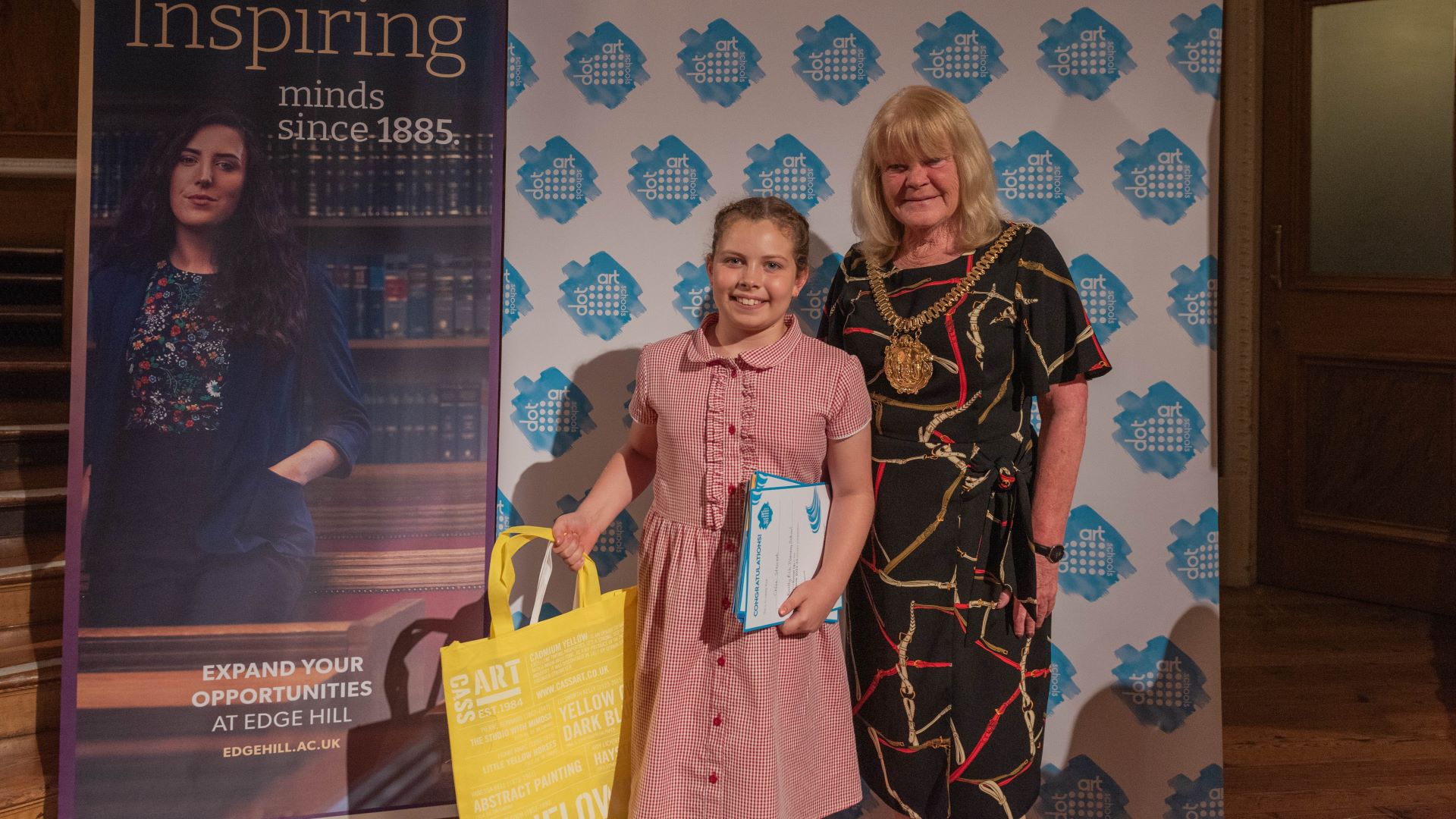 A runner up poses for a photo at the new exhibition at Walker Art Gallery that celebrates children’s art.