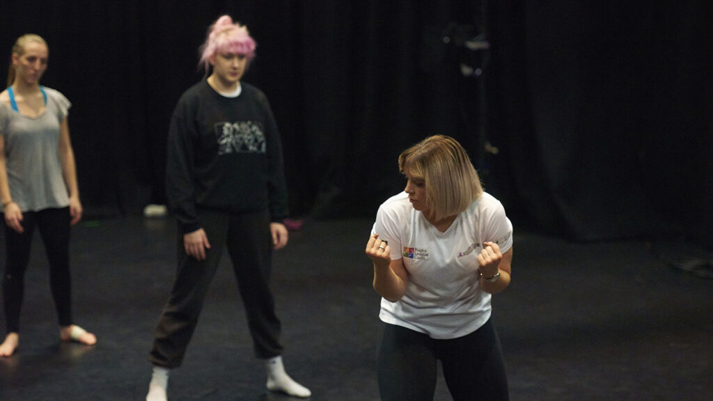 Amy Burdon leads Edge hill students in a dance workshop.