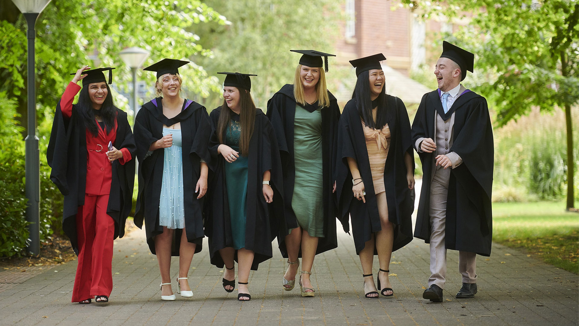 Students in their graduation robes and mortar boards