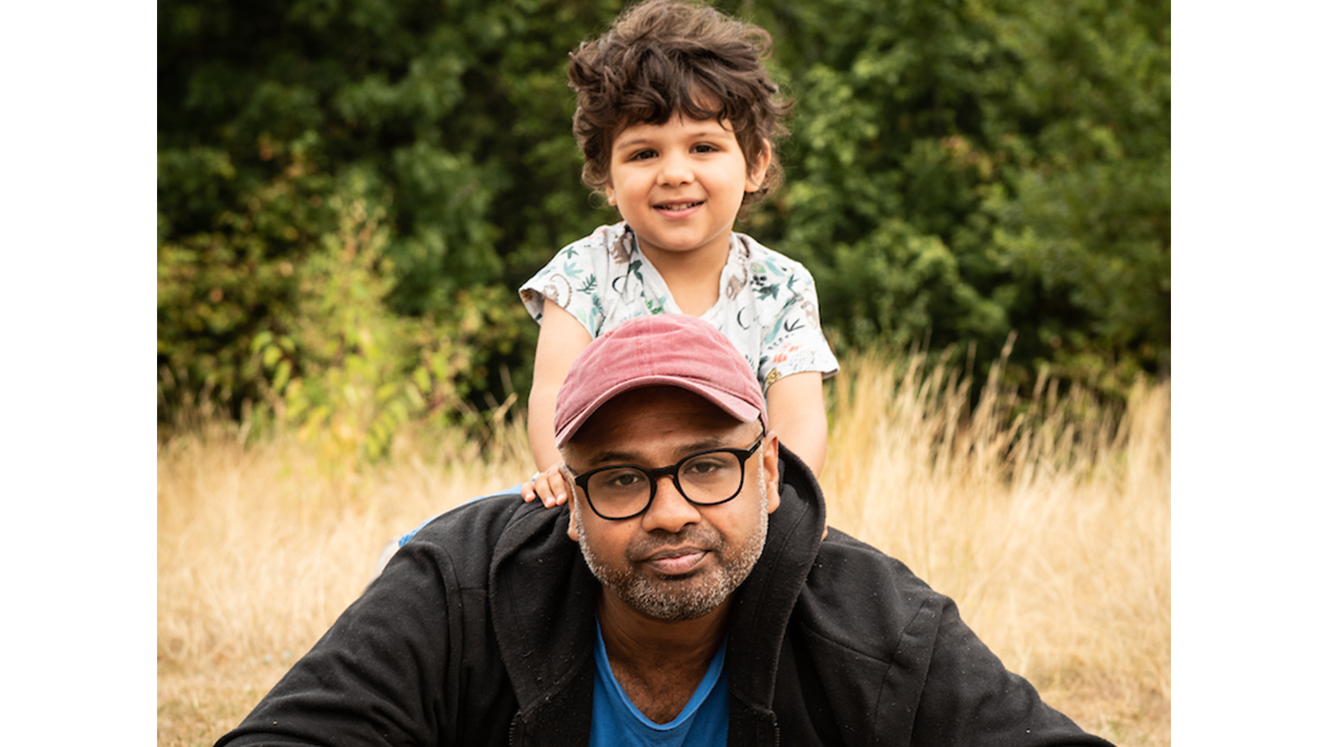 An image of a father and daughter.