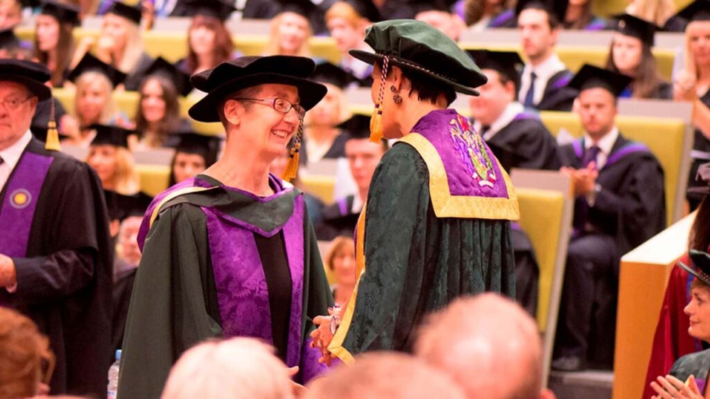 Helen Pankhurst accepting an honorary doctorate