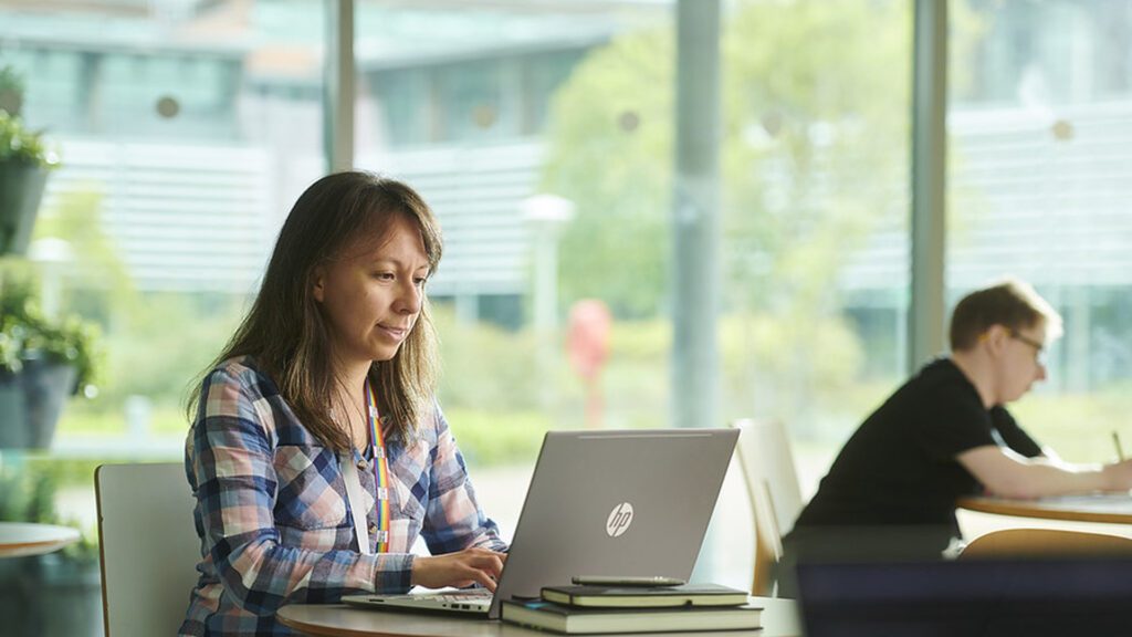 Student studying on a laptop