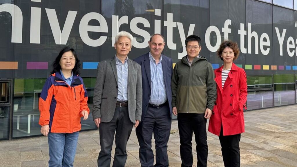 Professor Ray Sheriff and engineers from Sichuan University stand outside Catalyst.