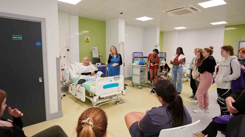 Prospective students attending a nursing taster day in the skills centre.
