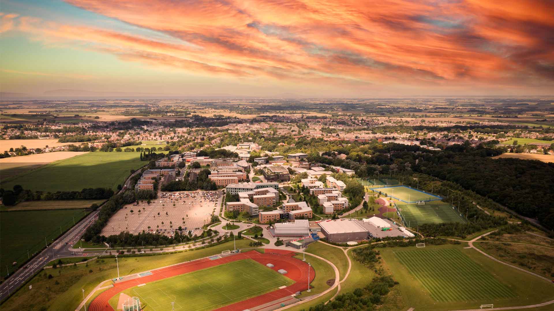Aerial drone shot of the Edge Hill Ormskirk campus at sun set.