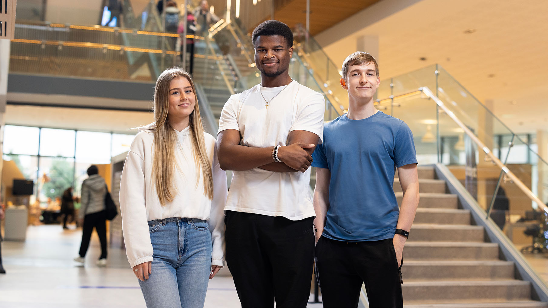 Three students stood together in the Catalyst building.