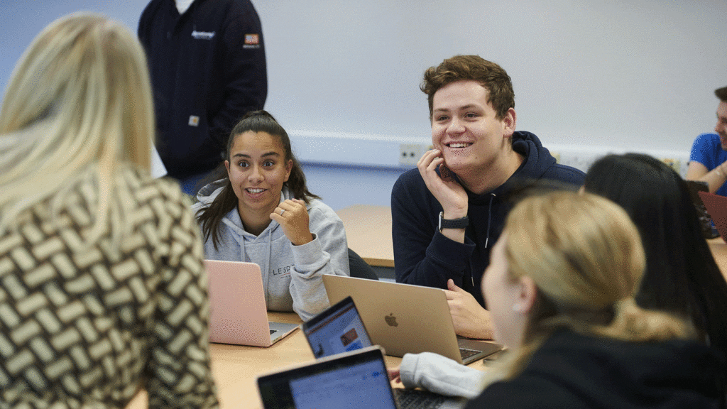 Students in a seminar room in the Business School.