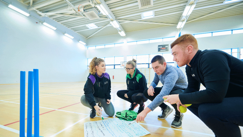 Students in a sports hall.