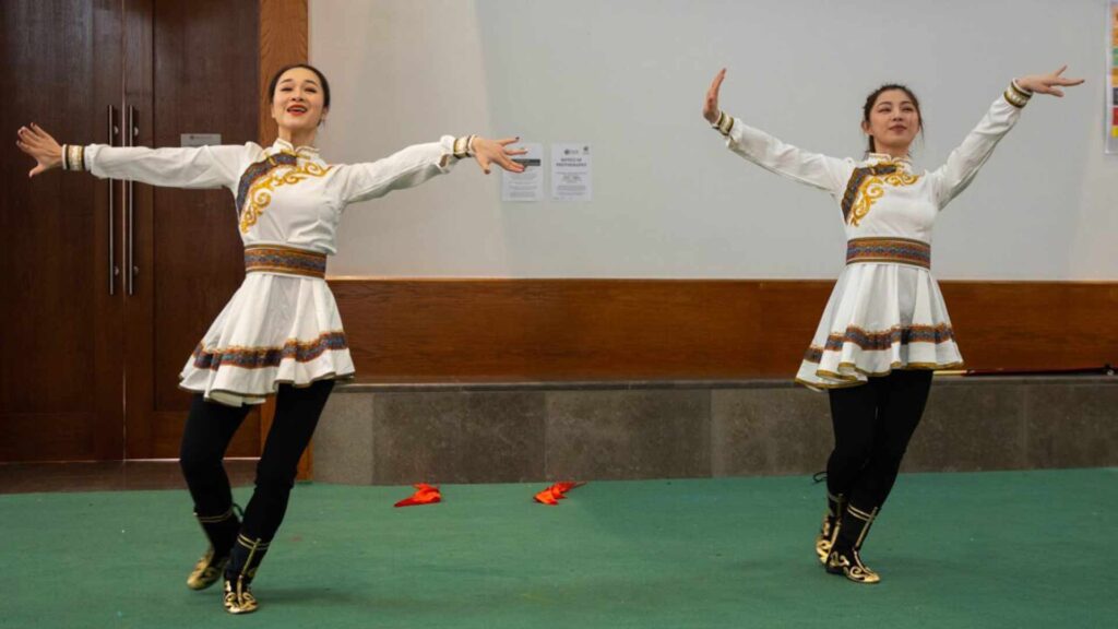 Two performers taking part in Chinese dance as part of the Chinese New Year celebrations.