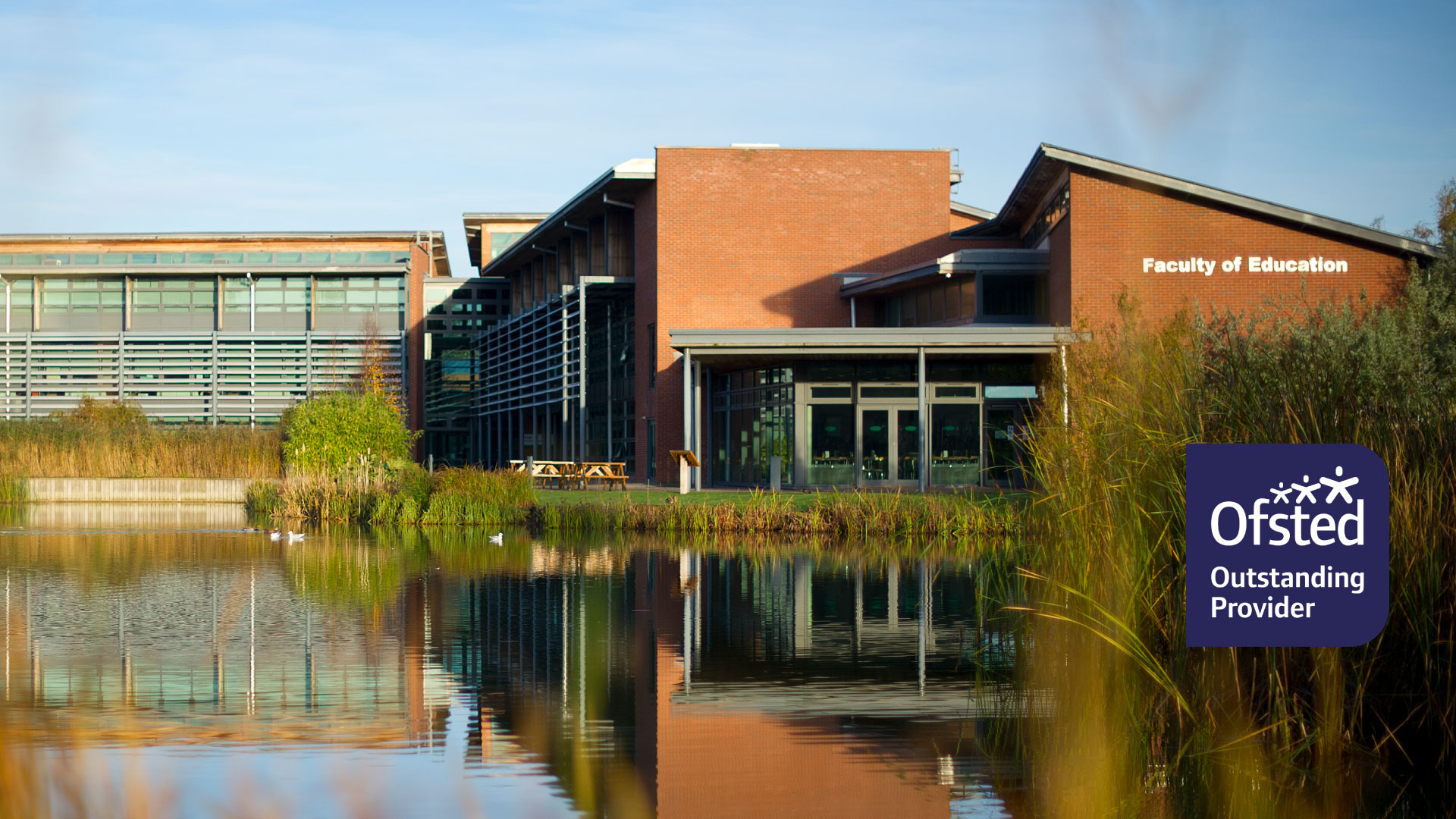 exterior shot of the faculty of education building with Ofsted outstanding provider logo in the bottom right hand corner