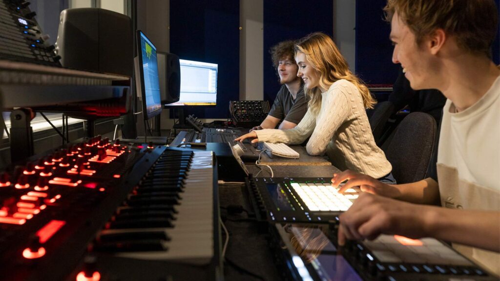 Music Production students in Creative Edge's post-production studio