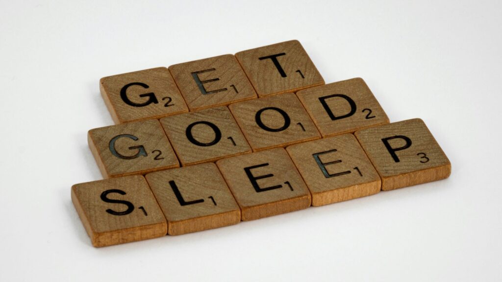 Scrabble titles spelling out the words, "Get good sleep".