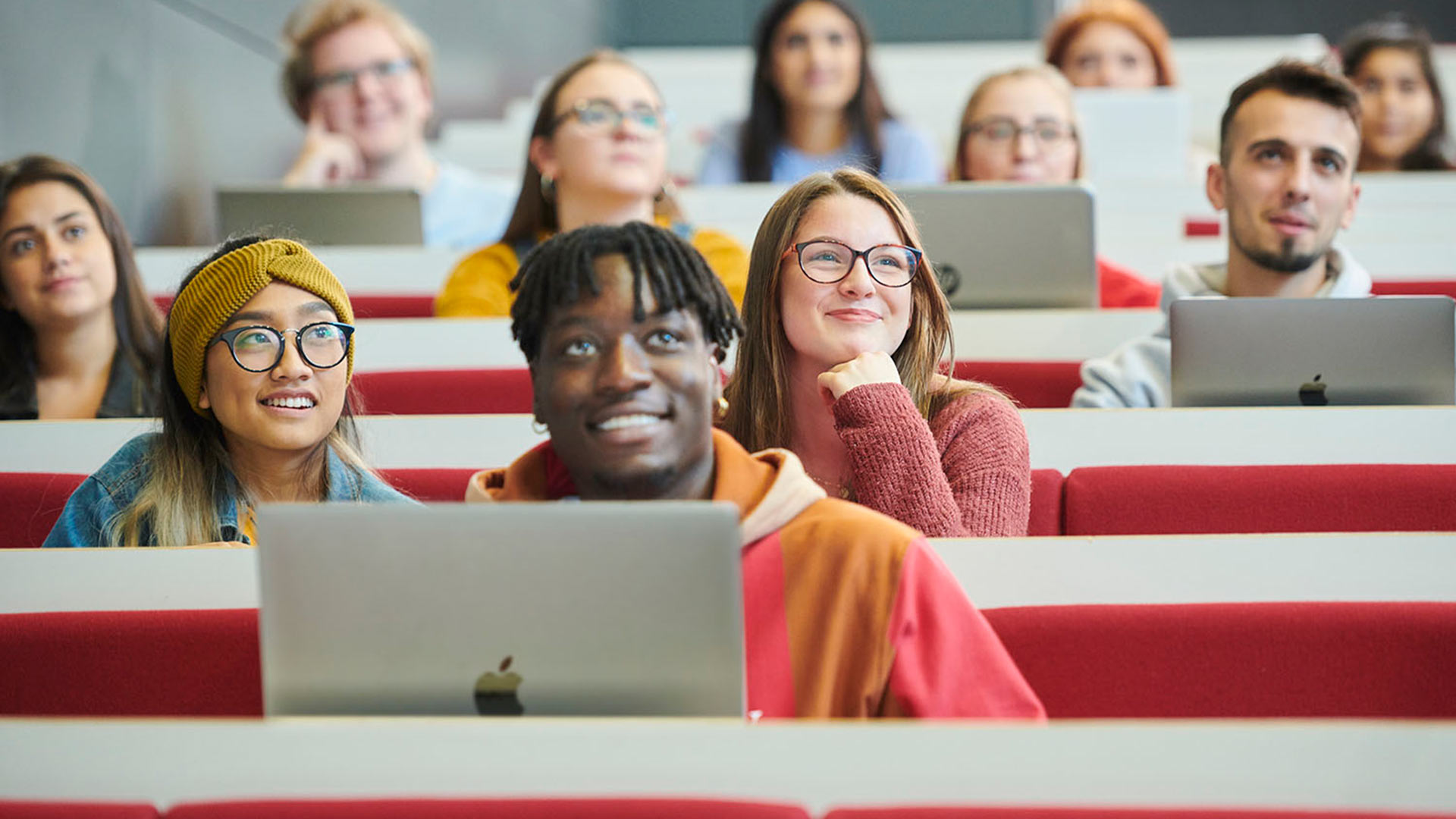 Students listen attentively during a lecture.