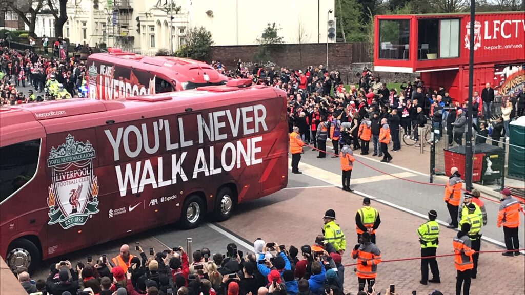 The Liverpool team coach arrives at Anfield