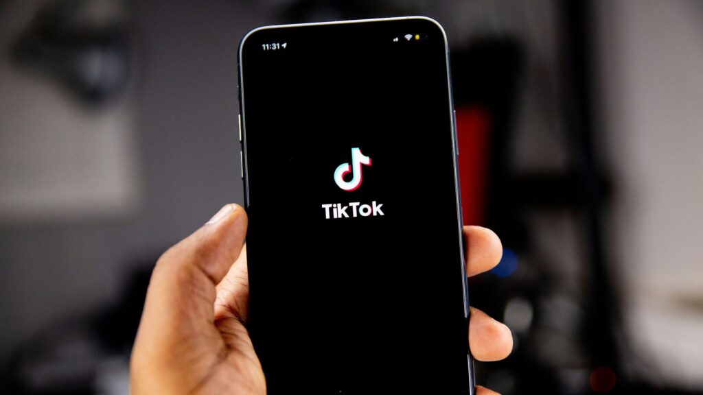 A mobile phone showing the Tik Tok app