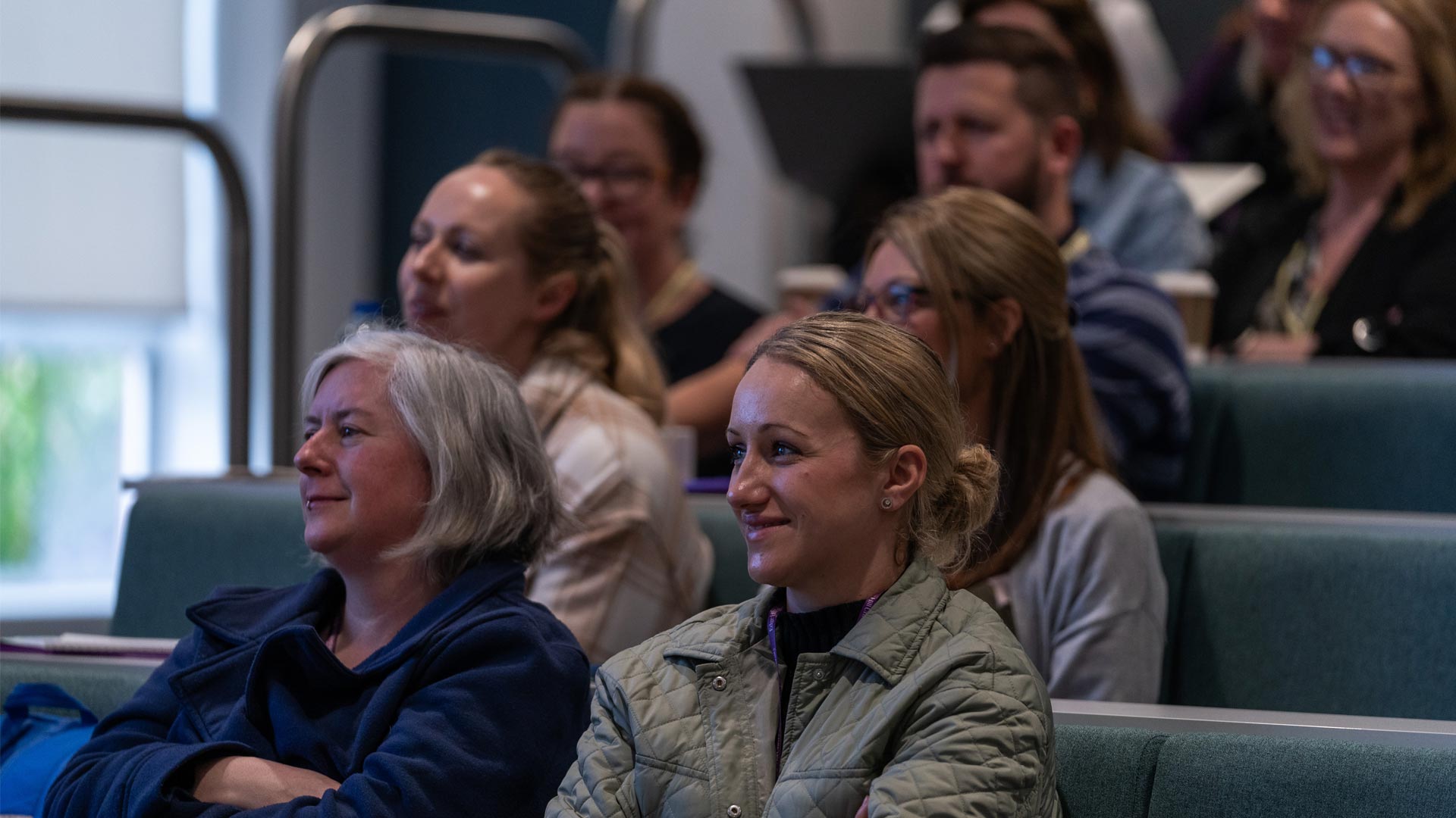 teachers sitting at a conference