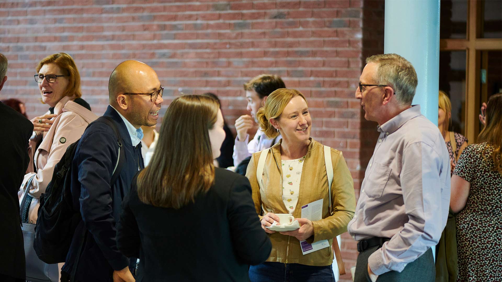 Students around laptops