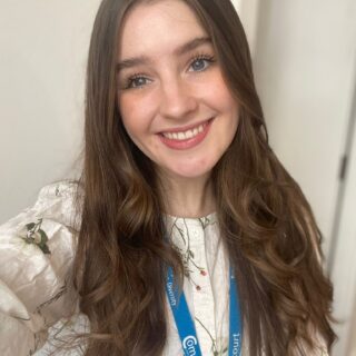 Headshot photo of Alex Thomson