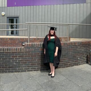 Picture of Alex Lynch in cap and gown on graduation day..