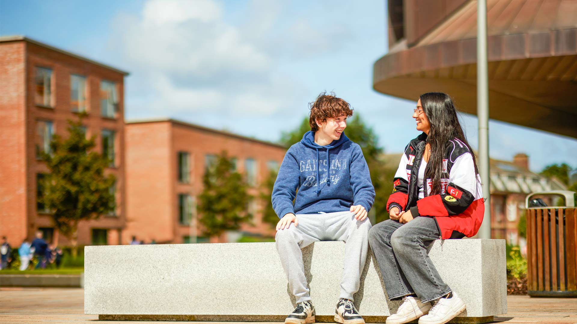 Students sitting outside Catalyst