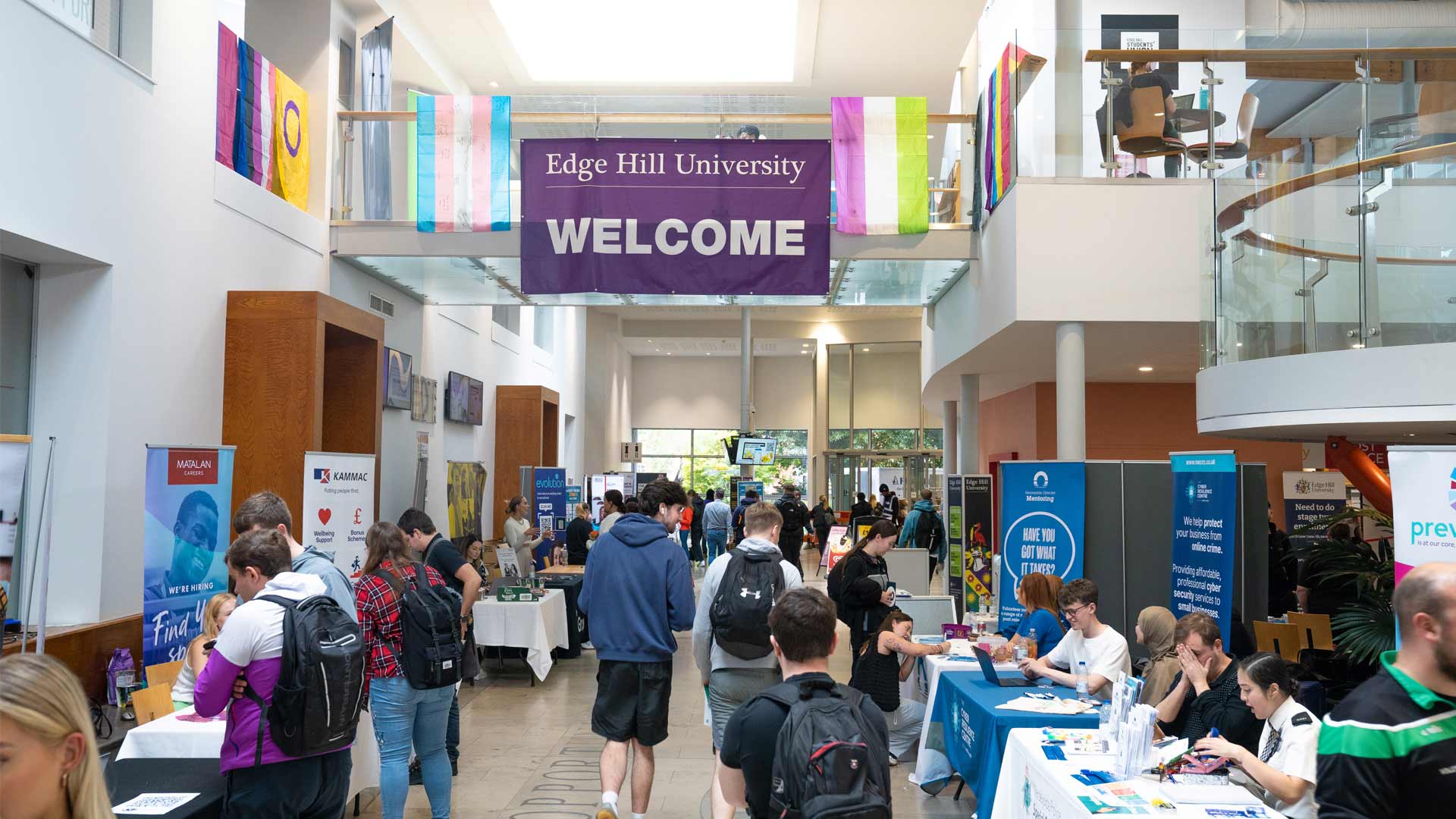 Students walking through Careers Fair taking place in the Hub on campus
