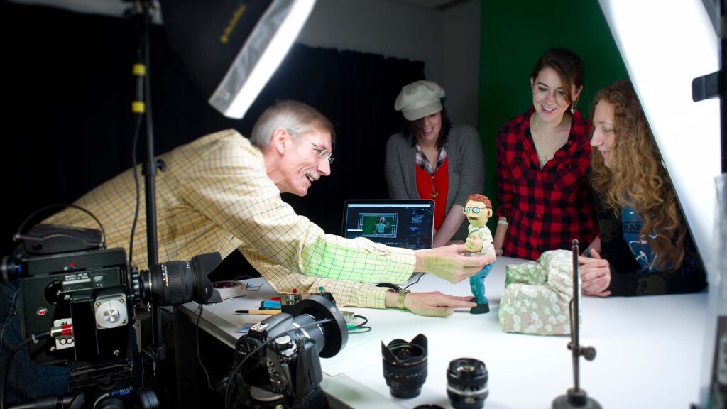 Animation tutor demonstrates a stop-motion technique to students.
