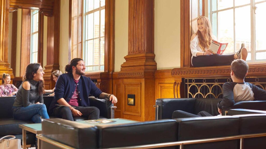 A group of students sitting in Hale Hall.