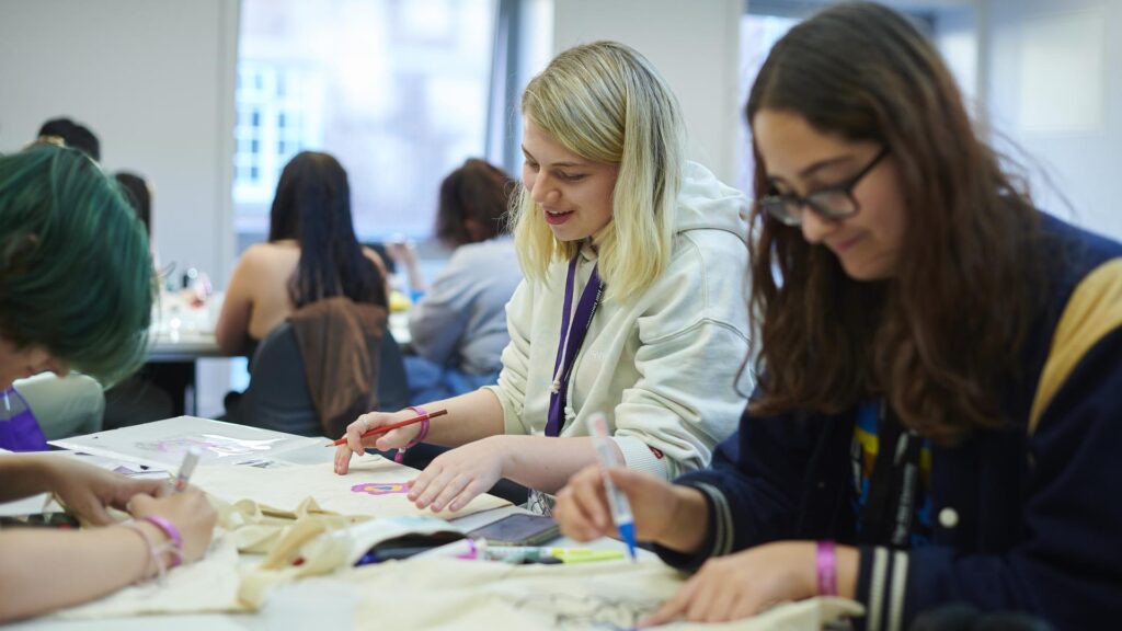 Students sat at a classroom table