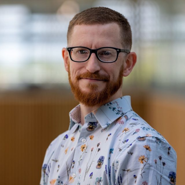 Headshot of Dr Nathan Thomas.