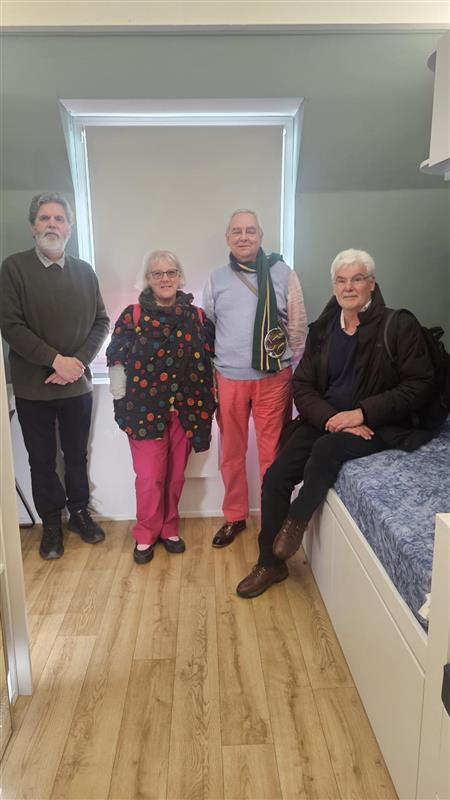Alumni Chris, Linda, Phil and Paul in John Dalton halls